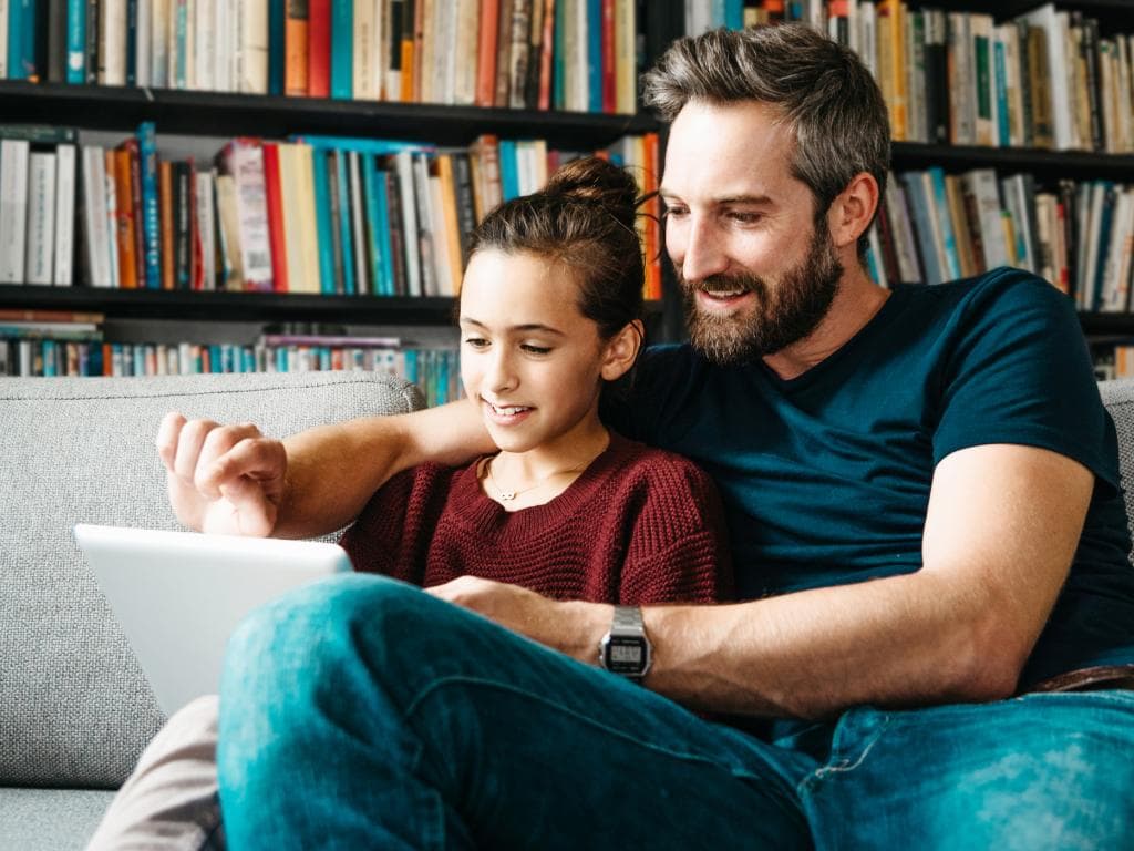 Parent and child with tablet L